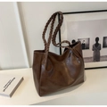 Large dark brown tote bag with woven handles and white contrast stitching detail - Brown