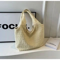 Detailed view of beige waffle texture fabric on a large capacity hobo tote bag - Yellow