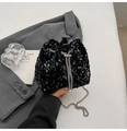 Detail of black sequined bucket bag with silver chain and pearl drawstring charms - Black