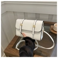 Detail of white minimalist crossbody bag with gold buckles and black edge stitching - White