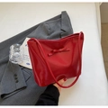 Glossy bright red patent leather tote bag with elegant bow detail and slim shoulder strap - Red
