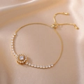 Golden sunflower zircon bracelet with adjustable slider chain on elegant satin background - Sunflower (Gold)
