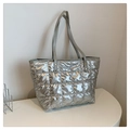 Detail of silver metallic quilted tote bag with large square stitching and thin straps - Silver