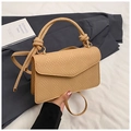 Detail of beige woven texture handbag with flap closure and elegant knot handle decor - Khaki