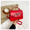 Chic red leather handbag with rhinestone bow decoration and crossbody strap - Red
