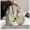 Minimalist beige nylon shoulder bag with pleated drawstring design and wide strap - White