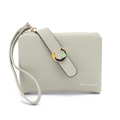 Close-up of light green textured leather wallet with horseshoe metal buckle and wristlet - Green