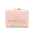 Short faux leather wallet for women in light pink featuring forest print and metal clasp - Pink