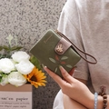 Olive green leaf embroidered wallet with bird clasp and hand strap on stone background - Grey Green