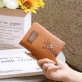 Brown PU leather short wallet featuring a cute giraffe print and a wrist strap - Orange
