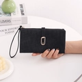 Close-up of black matte PU leather long wallet with gold leaf buckle on a white table - Long Style / Black