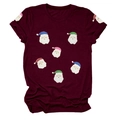Détail de l'imprimé graphique du Père Noël sur un T-shirt rouge bordeaux en coton - S / Hauts / Bordeaux