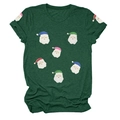 Détail d'un t-shirt de Noël vert foncé avec des imprimés de Père Noël à paillettes - S / Hauts / Vert Vintage