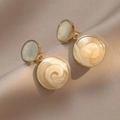 Elegant gold vintage round drop earrings with champagne resin and floral relief texture - Retro Rose Style (E0735)