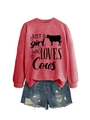 Flat lay of red sweatshirt with Just a Girl Who Loves Cows text and ripped denim shorts - Red (Black Font)