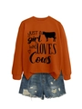 Orange long sleeve sweatshirt with cow silhouette print paired with denim shorts - Burnt Orange (Black Font)