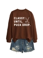 Close-up of coffee brown sweatshirt with Classy Until Puck Drop hockey graphic and denim shorts - Coffee (White Print)