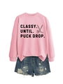 Detailed flat lay of pink hockey sweatshirt with black letters and denim shorts - Pink (Black Print)
