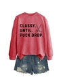 Detail of red crewneck sweatshirt with hockey slogan and distressed blue denim shorts - Red (Black Print)