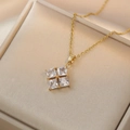 Elegant gold necklace with four square zircon pendant in a floral clover arrangement - Zirconia Necklace And Earrings Jewelry Set (X2406)
