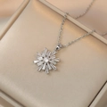 Collana a fiocco di neve in argento con pendente in zircone su raso champagne - Stile Fiocco di Neve in Zirconia (X2407) / Argento