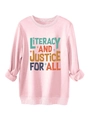 Close-up of pink fleece sweatshirt showing LITERACY AND JUSTICE FOR ALL graphic and ribbed cuffs - Pink