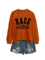 Flat lay of an orange Race Day sweatshirt paired with blue distressed denim shorts - Burnt Orange (Black Font)