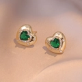 Detail of vintage heart earrings with green zircon and gold star embossing on silk - E0665 Emerald Zircon Earrings