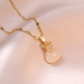 Elegante gouden gelukszak-ketting met witte steen en zirkoon op roze zijde - Gouden Gelukszakje Ketting
