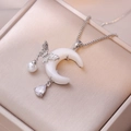 Elegant silver necklace with moon pendant, pearl accents and a butterfly charm on silk - Steel Color Dreamy Star Moon Necklace (With Pendant) (X2562)