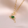 Golden emerald reindeer necklace with crystal accents on pink satin background - Gold Reindeer (Necklace + Pendant)