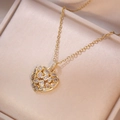 Golden heart-shaped necklace with sparkling zircons displayed in a luxury jewelry box - X2649 White Zirconia Necklace (Pendant Included)