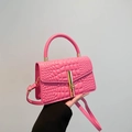 Pink crocodile pattern handbag with gold metal clasp and adjustable shoulder strap - Pink
