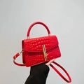 Red crocodile texture crossbody bag with gold lock and rigid top handle for women - Red