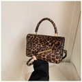 Fashionable leopard print handbag with gold metal bar and adjustable shoulder strap - Brown