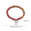 Vista macro del bracciale in argento S925 con perle di cinabro 8mm e legno di sandalo - Bracciale di perline in legno di pesco argento S925 (SF0017)