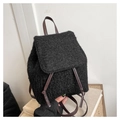 Detail of minimalist black wool backpack with faux leather straps and drawstring closure - Black