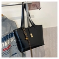 Black quilted tote bag with golden lock, long shoulder strap and decorative charms - Black with Pendant