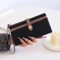 Détail du portefeuille long en cuir PU noir avec bordure marron et fermeture éclair dorée - Noir