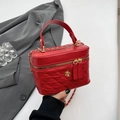 Red quilted leather handbag with gold flower clasp and chain strap for women - Red