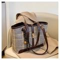 Brown and beige houndstooth tote bag with gold charm on a stylish chair - With Charm / Khaki