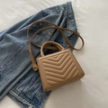 Elegant beige ladybag with V-shaped chevron quilting and adjustable shoulder strap - Khaki
