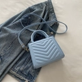 Quilted light blue ladybag with V-stitch pattern and detachable shoulder strap - Blue