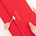 Red PU leather short wallet featuring a delicate golden leaf buckle and textured finish - Red