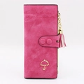 Lange damesportemonnee van fuchsia suède met kwastje en gouden paraplu-logo - Magenta