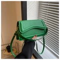 Detail of bright green crossbody bag featuring wavy edge stitching and gold metal buckle - Green