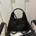 Vintage black faux suede tote with butterfly applique and metallic eyelet details - Black