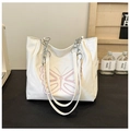 Detail of white tote bag with pink butterfly embroidery and metal chain strap - White