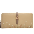 Detailed macro of a long leather wallet with daisy floral print and metallic ring clasp - Apricot