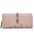 Detail view of pink long wallet featuring floral prints and golden metal buckle closure - Pink